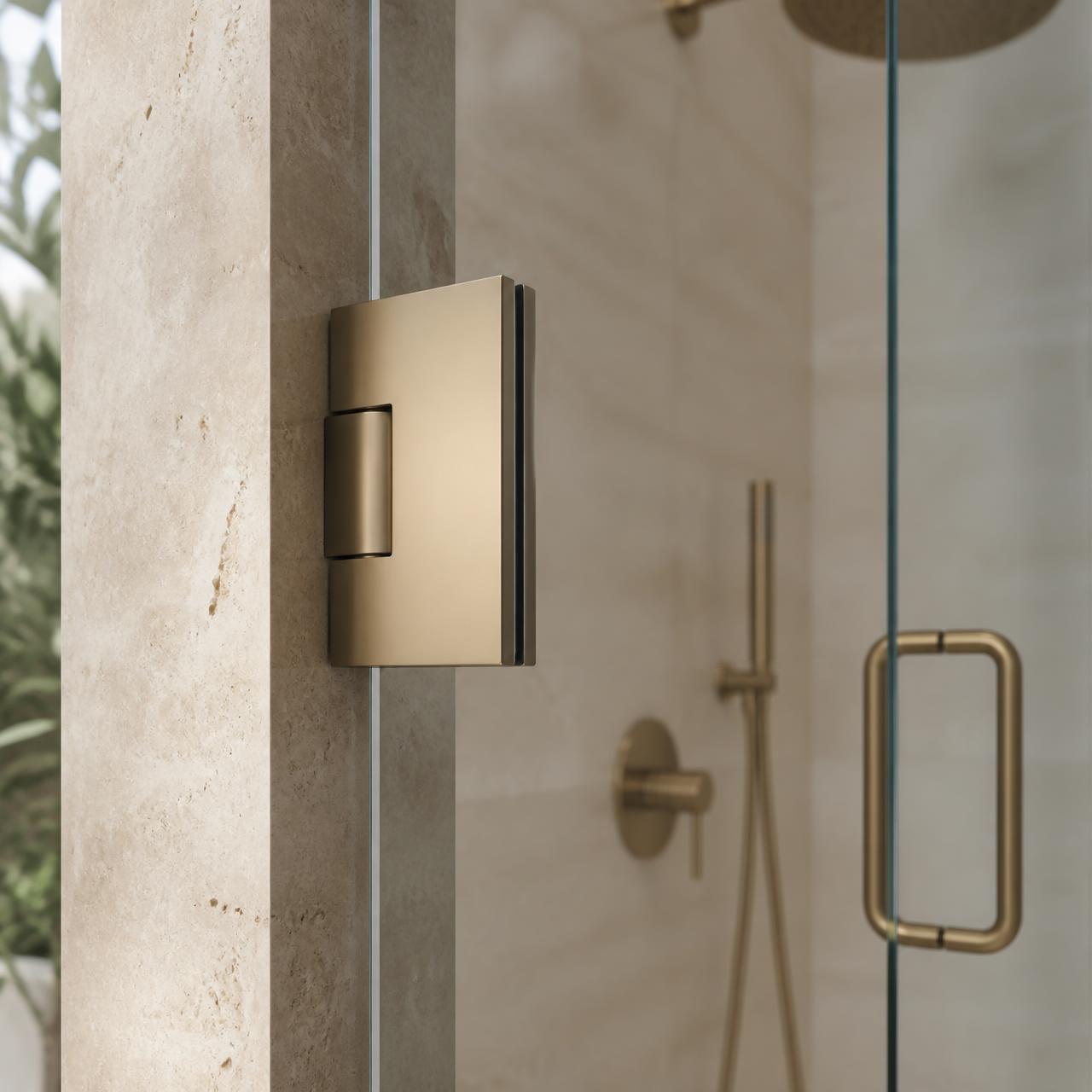 Precision shower hinge and glass edge detail